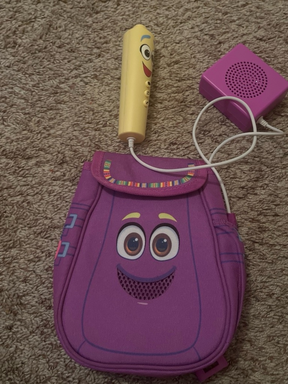 Purple Kids Singing Backpack Toy with Fun Face Design